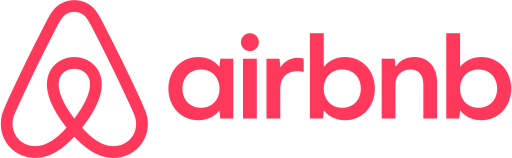 Airbnb logo in pink on a white background.