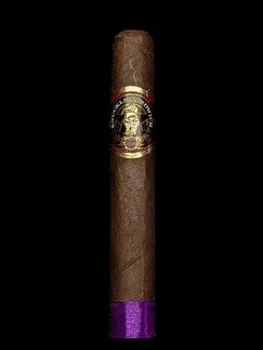 A single cigars standing upright with black background, purple bottom cap, and a gold and black band near the top.