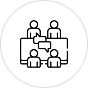 Outline of a meeting or conference with five people sitting around a table, three at the table and two standing behind.