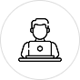 Simple line drawing of a person sitting at a desk using a laptop.