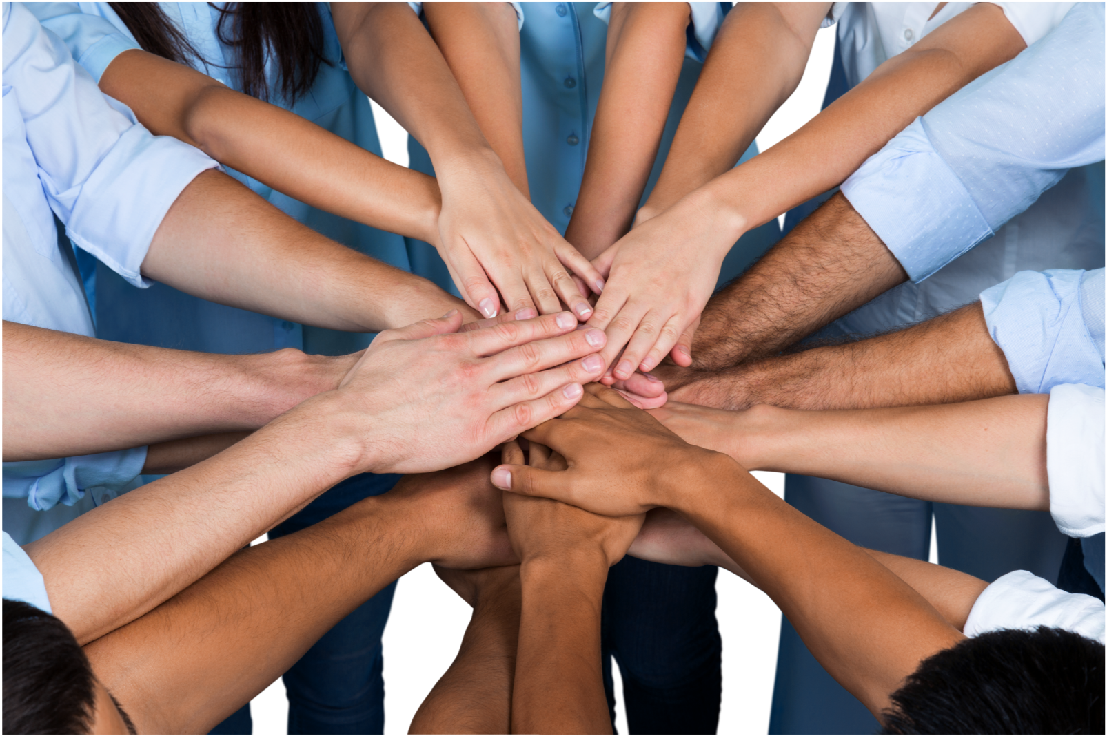 Multiple hands of diverse individuals overlapping in a stack, conveying team unity and teamwork.