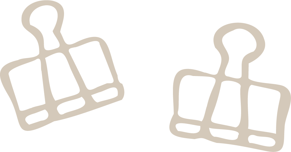 Two stylized outline icons of stamp pads with pens, beige in color, on a black background.