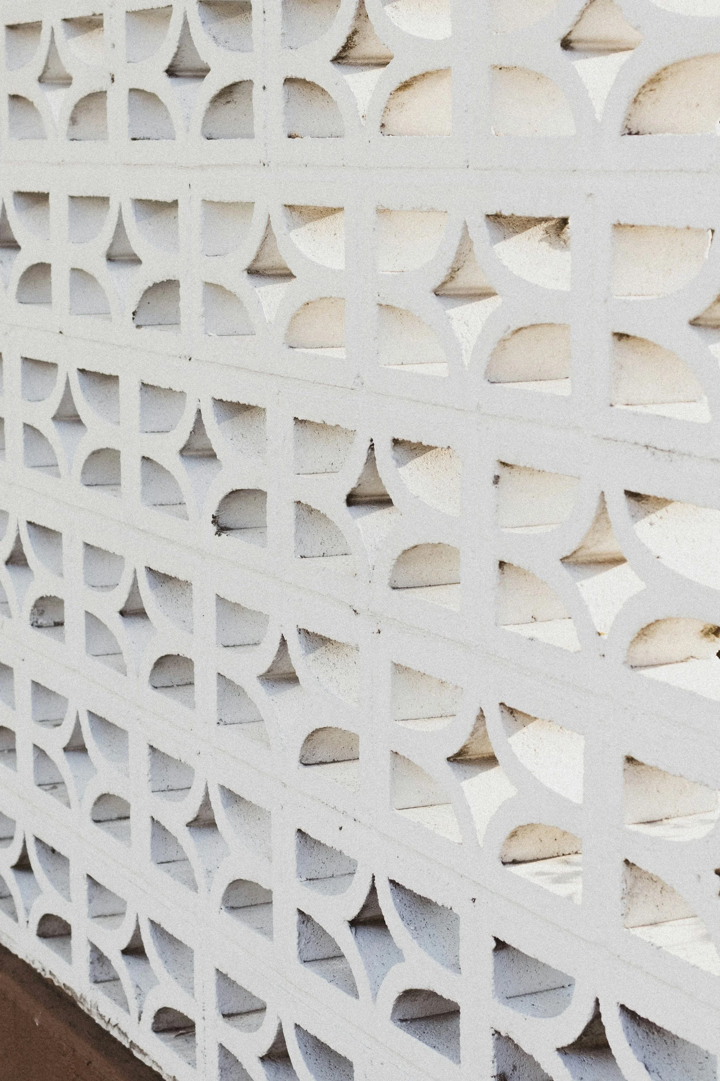 white breeze block is shown from a mid century home