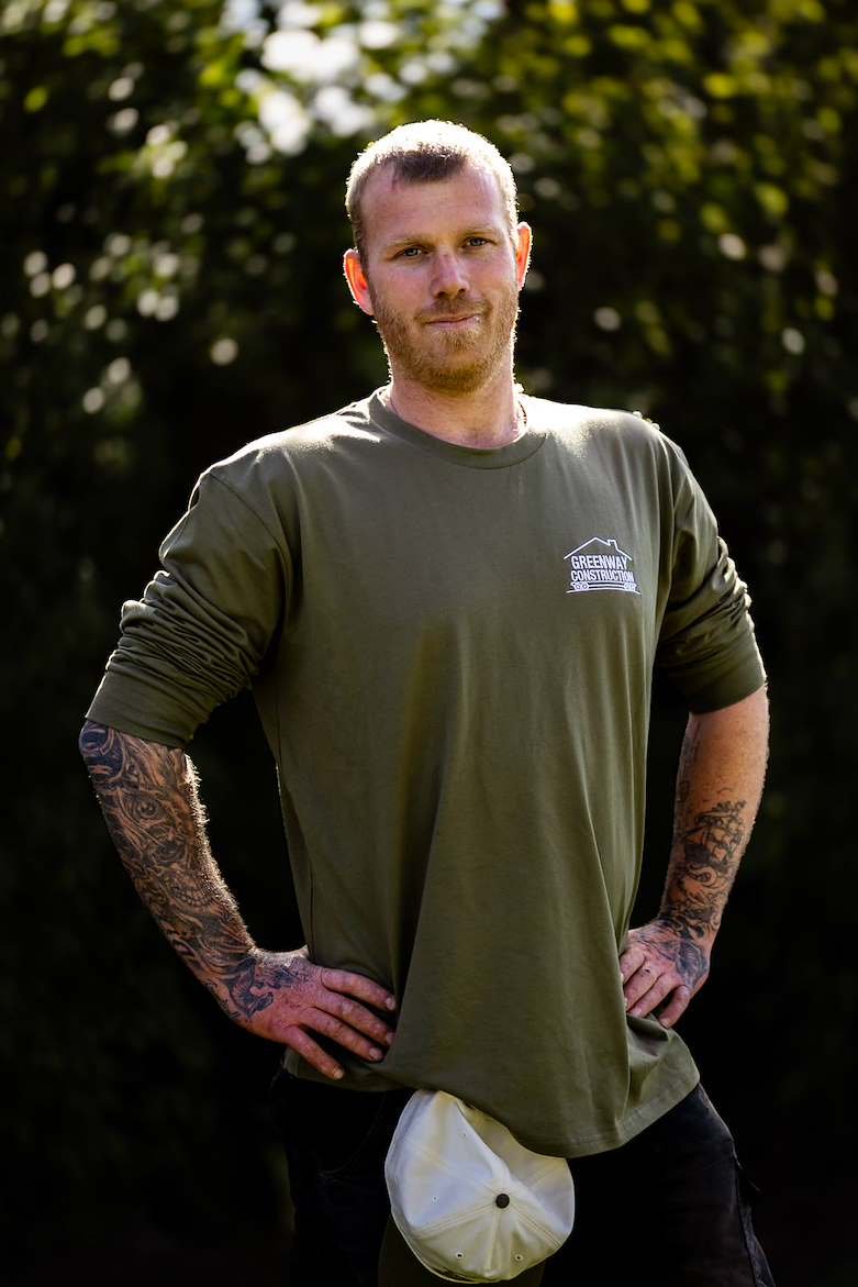 Greenway Construction Foreman and Structural Specialist, in branded apparel, on site in Christchurch, Canterbury