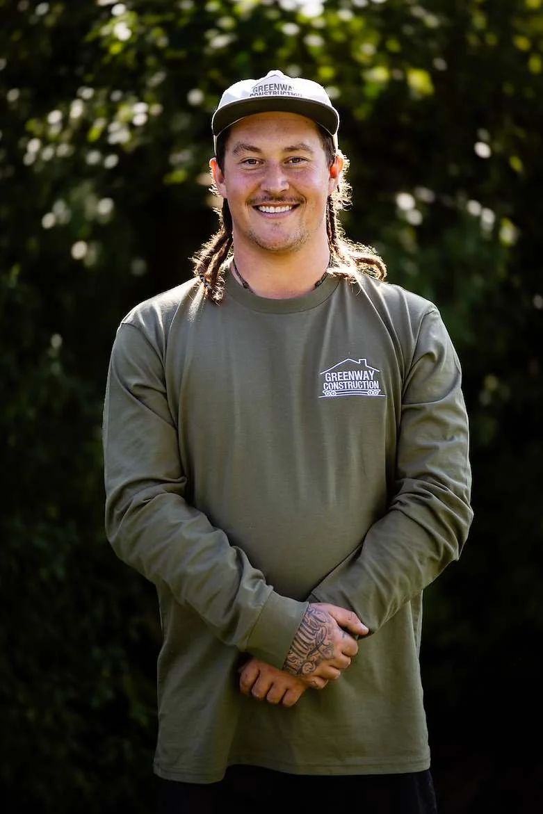 Greenway Construction team member wearing branded apparel - Christchurch house releveling specialist