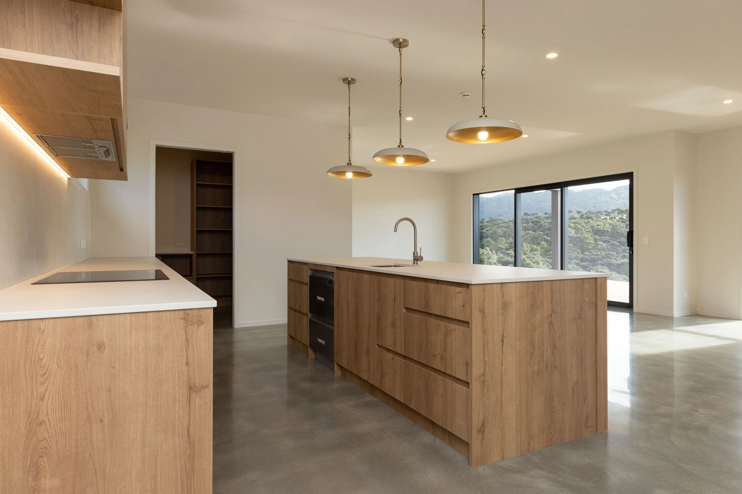Modern kitchen in a completed Benchmark Build new home in Mangawhai.