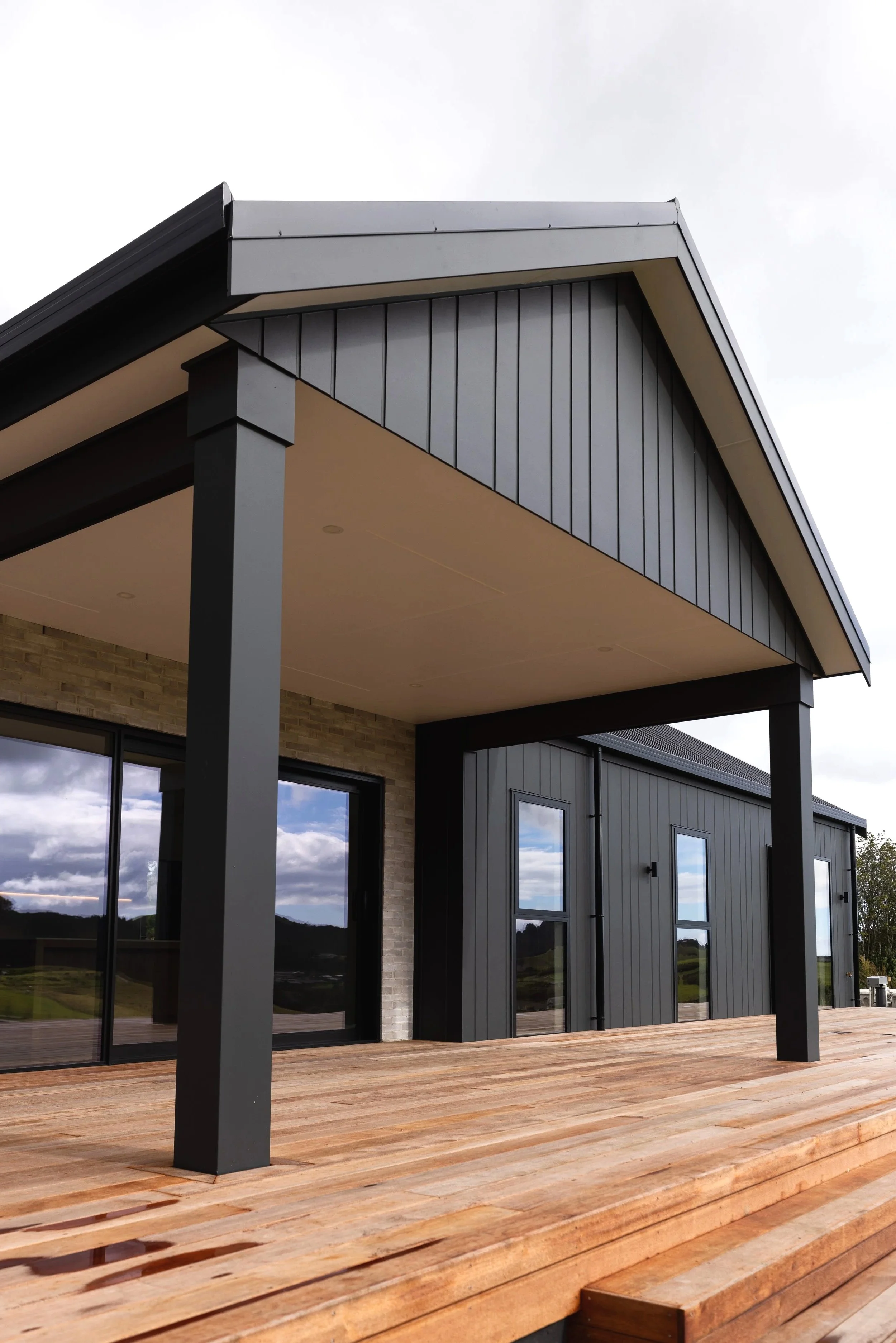 Completed Benchmark Build new home in Mangawhai with a large timber deck.