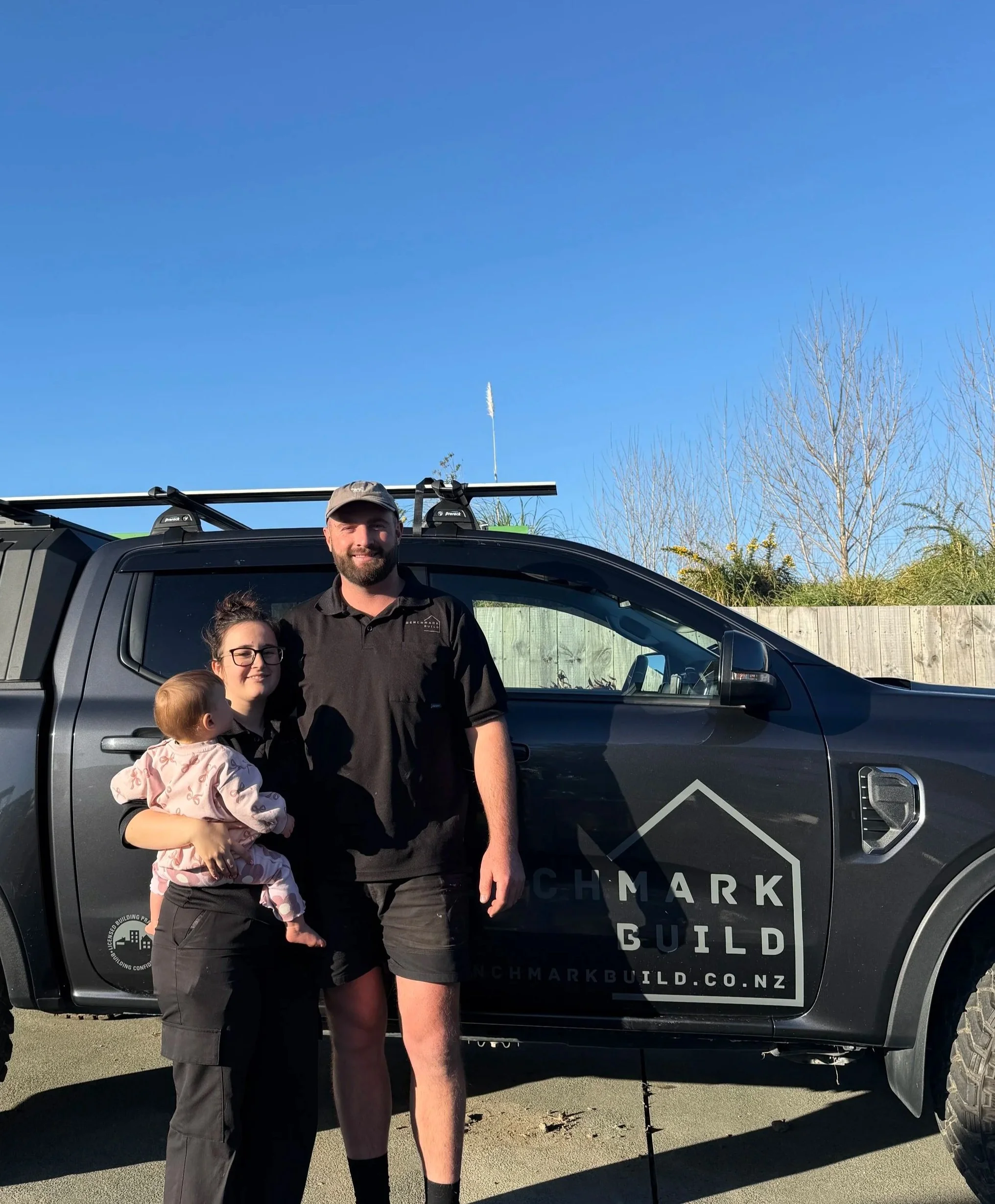 Duncan Northcott with his family beside the Benchmark Build vehicle in Mangawhai.