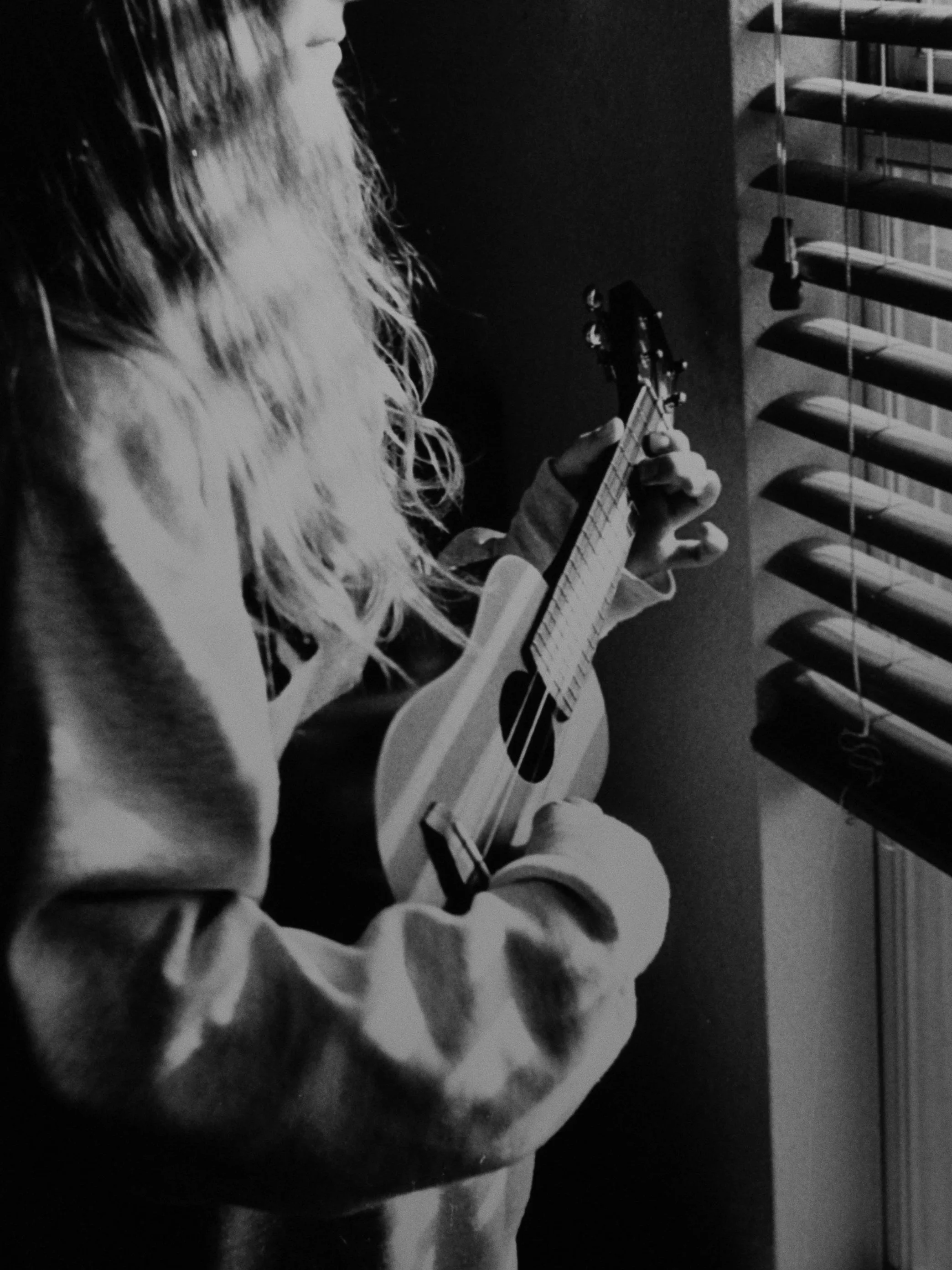 Ukulele in Window Light [R. Sherman / 35mm B&W] by J. Phagan Austin, TX 2025