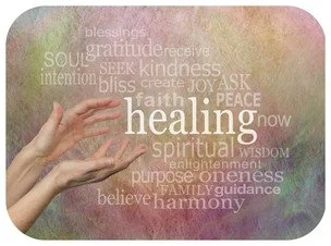 Hand reaching towards a colorful background with words like healing, faith, love, peace, spiritual, family, guidance, and harmony.