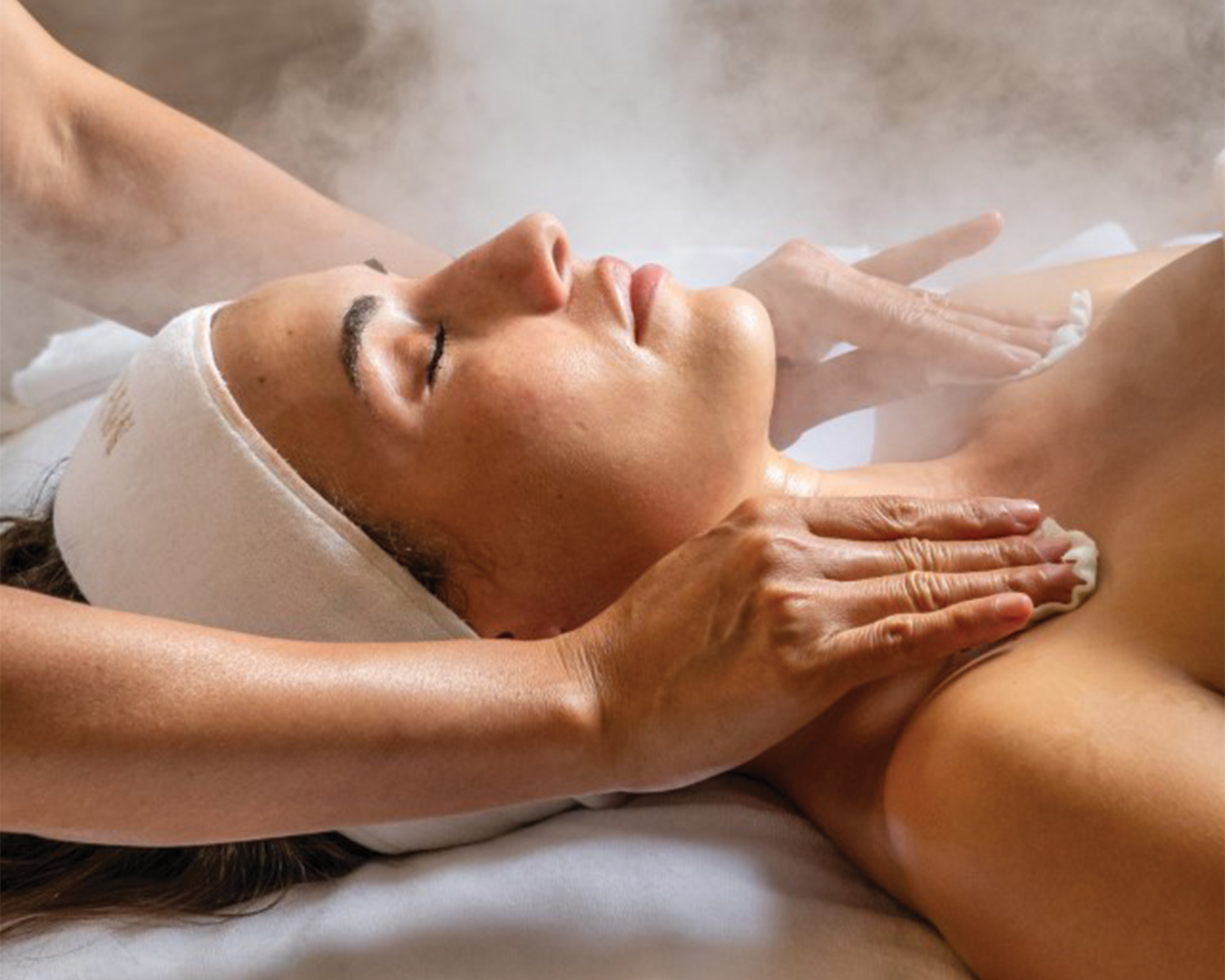 Promotional image titled 'The Signature Treatment — A High Performance Ritual' showing a therapist's hands performing a facial massage on a client lying down, with the 'Margy's Monte Carlo' logo at the bottom.