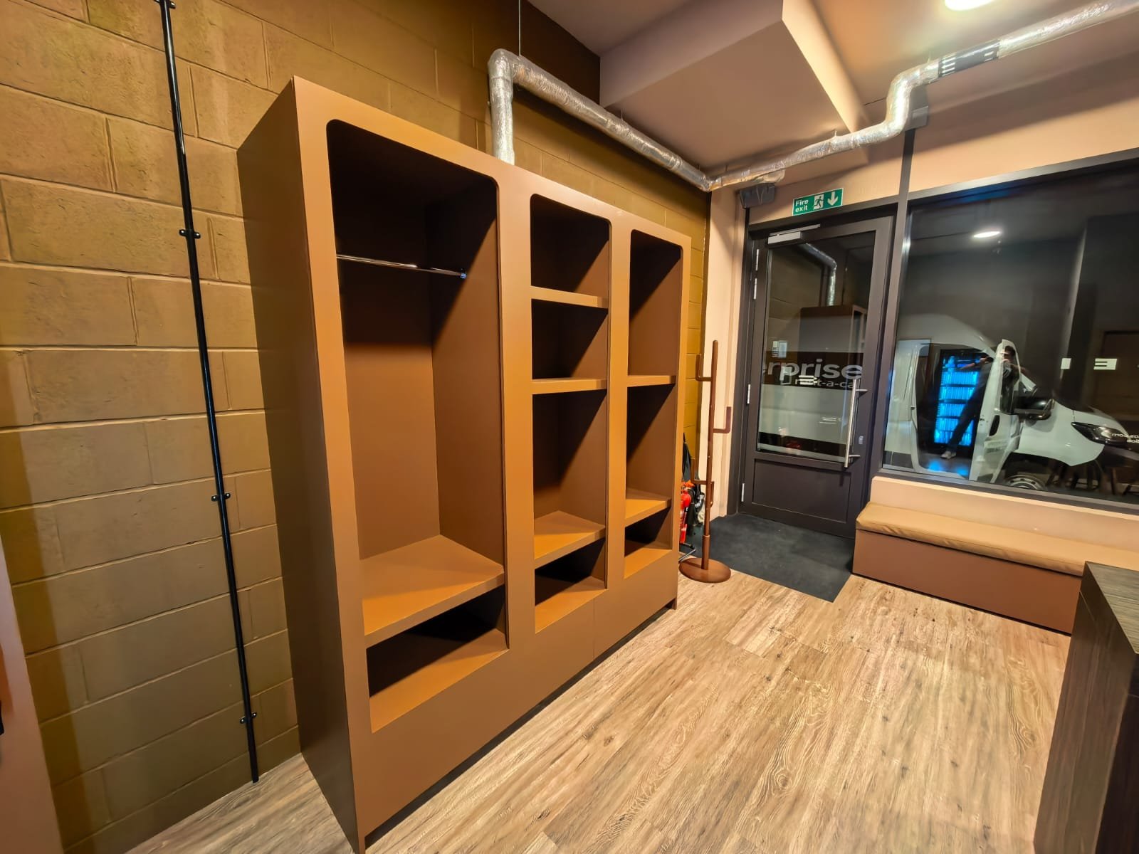 Bespoke cabinetry made by Egis Services for a pilates studio