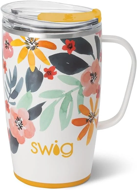 A travel mug decorated with a colorful floral pattern and the Swig logo in yellow at the bottom.