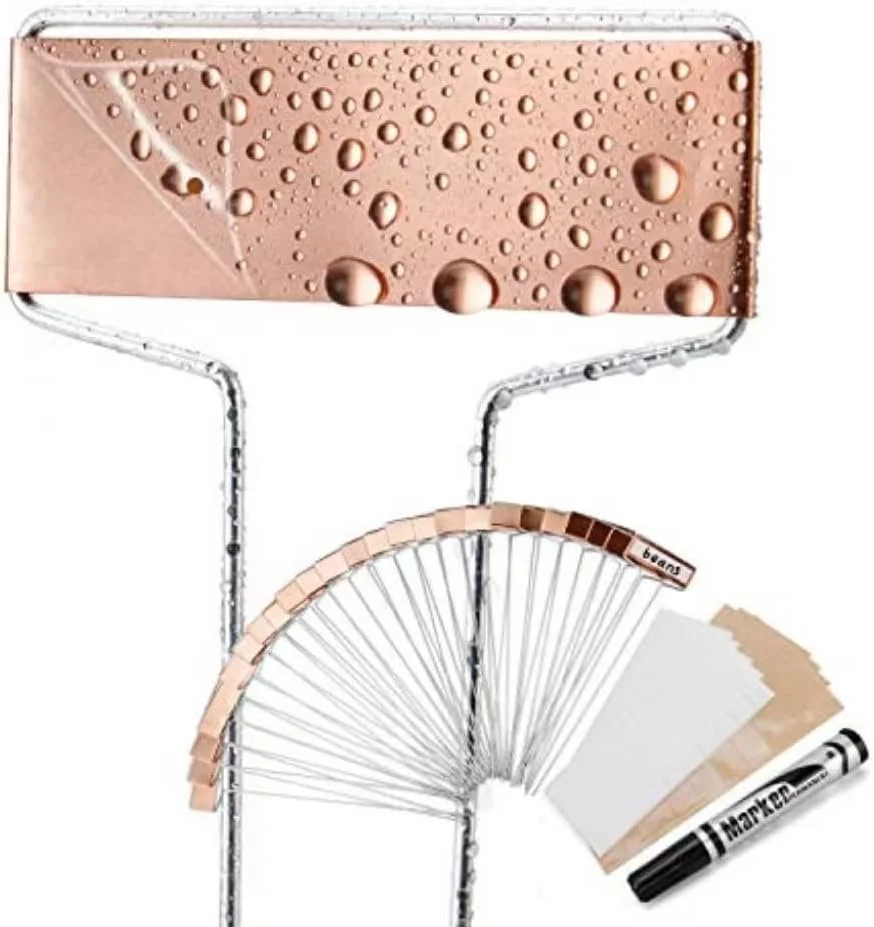 A color swatch sample fan deck, an black marker, and a pink chocolate bar with water droplets on it.