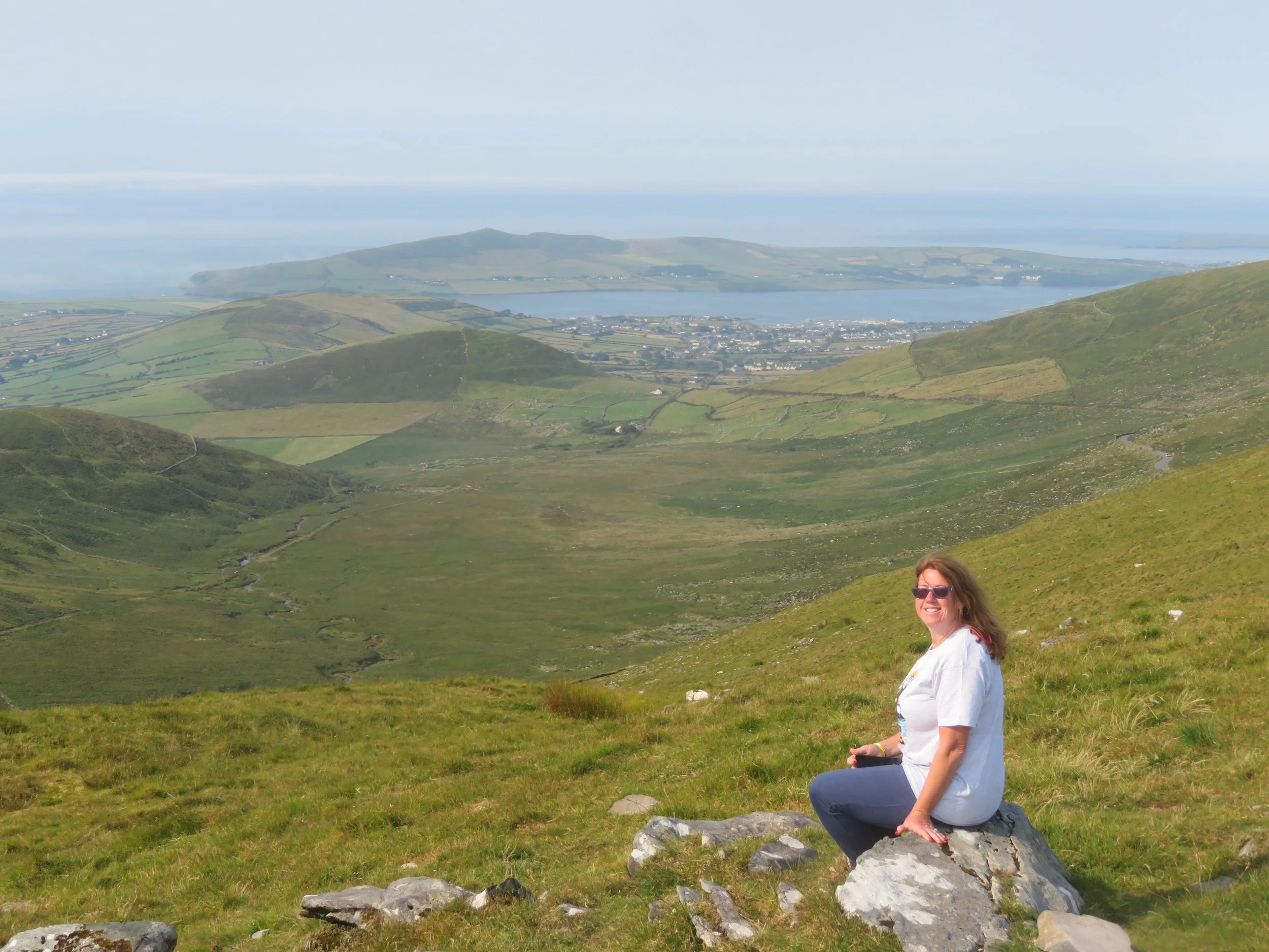 gina overlooking dingle harbor in ireland