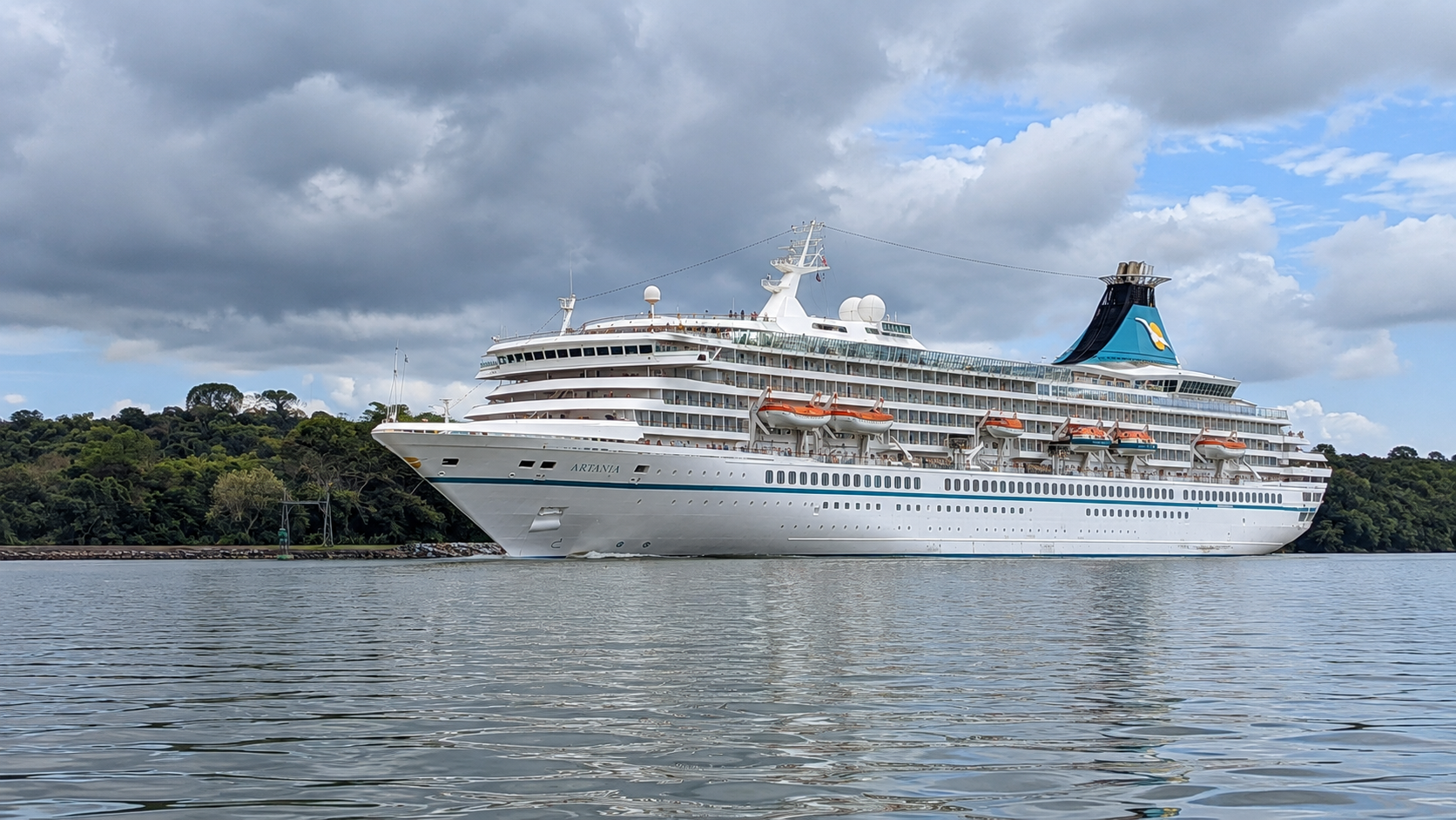 Cruise ship sailing through the Panama Canal during a morning boat excursion near Panama City.