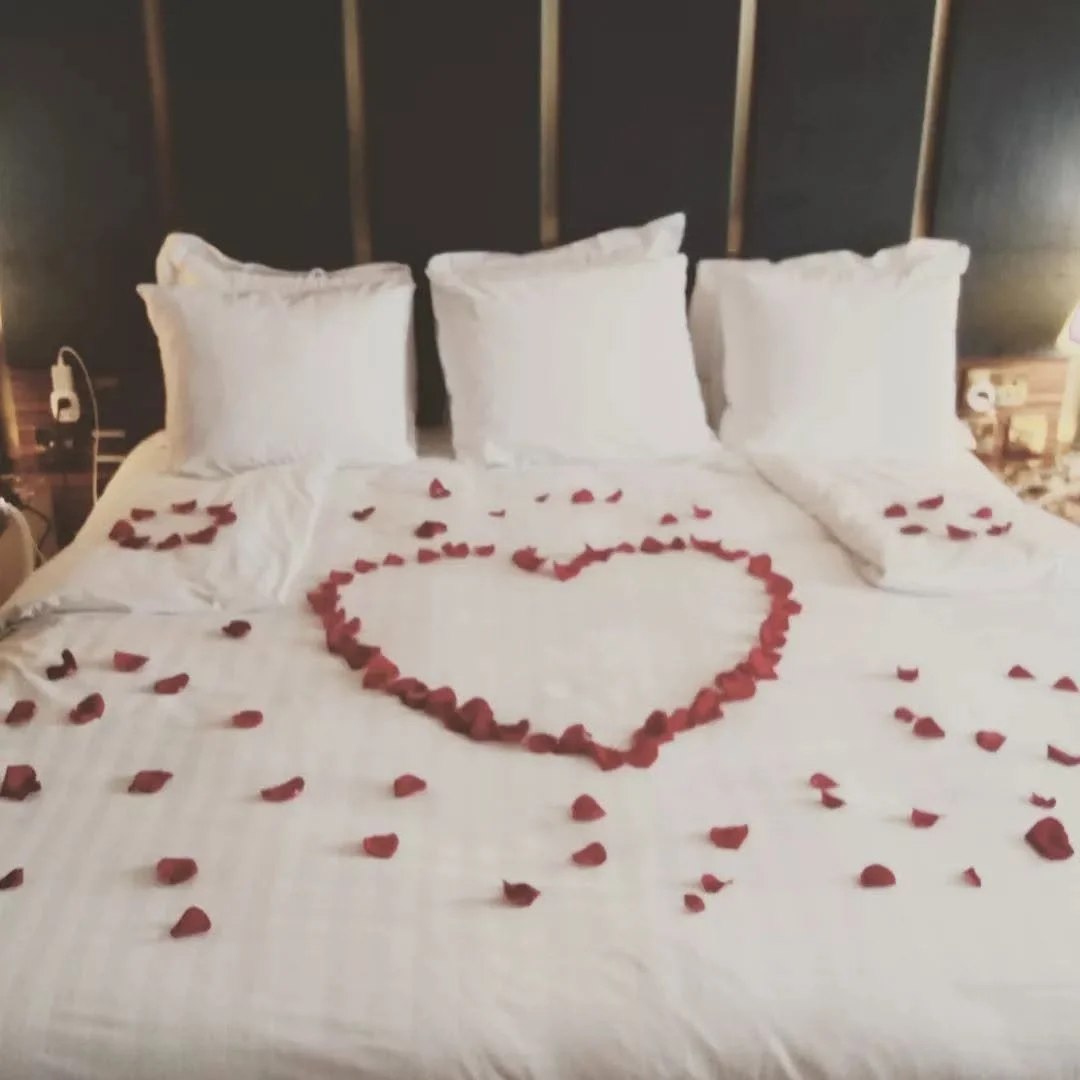 Rose petals arranged on the bed during our stay at the Savoy Hotel in Limerick, Ireland