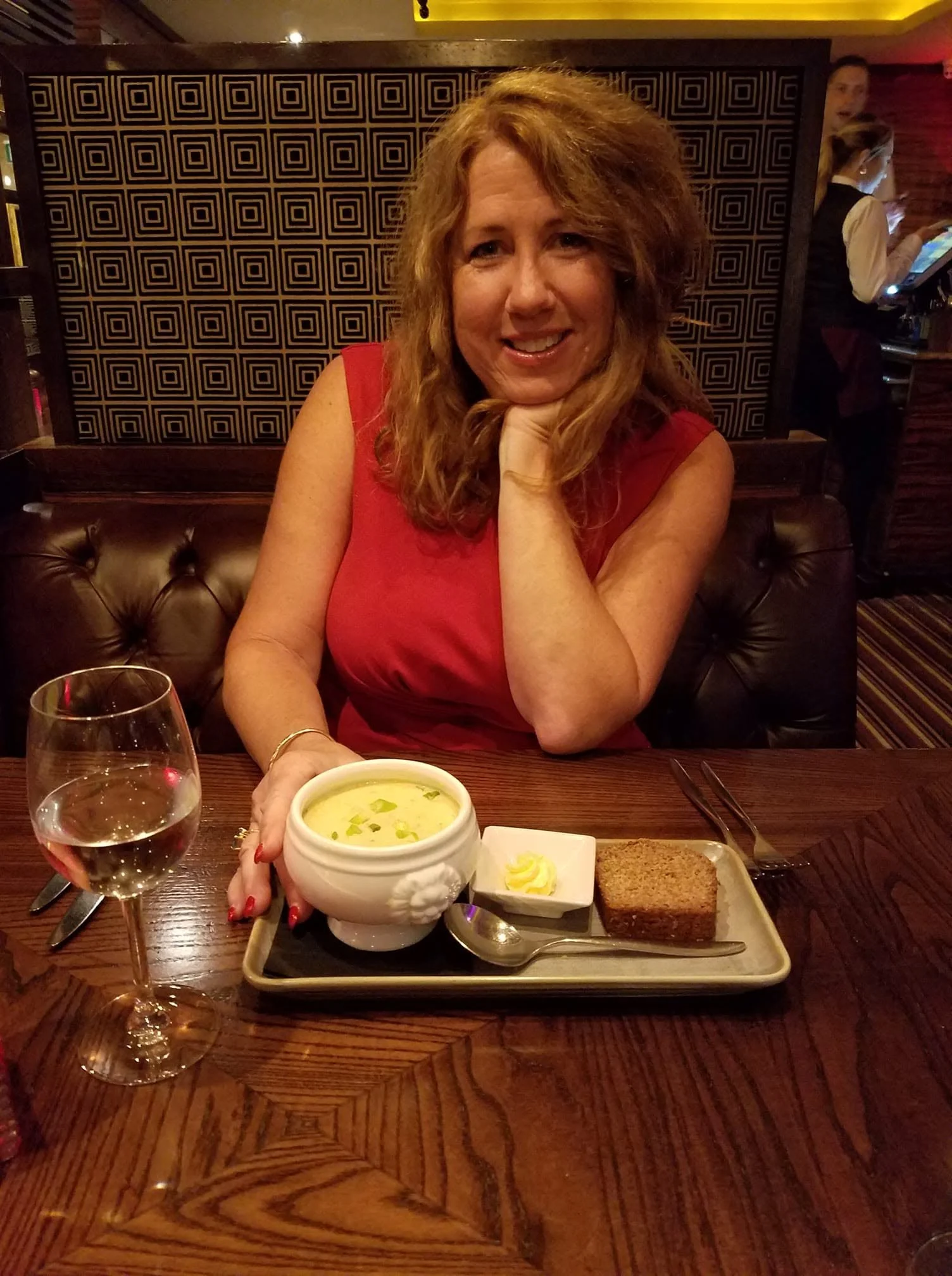 Gina enjoying dinner at The Savoy Hotel in Limerick during our 2022 Ireland road trip.