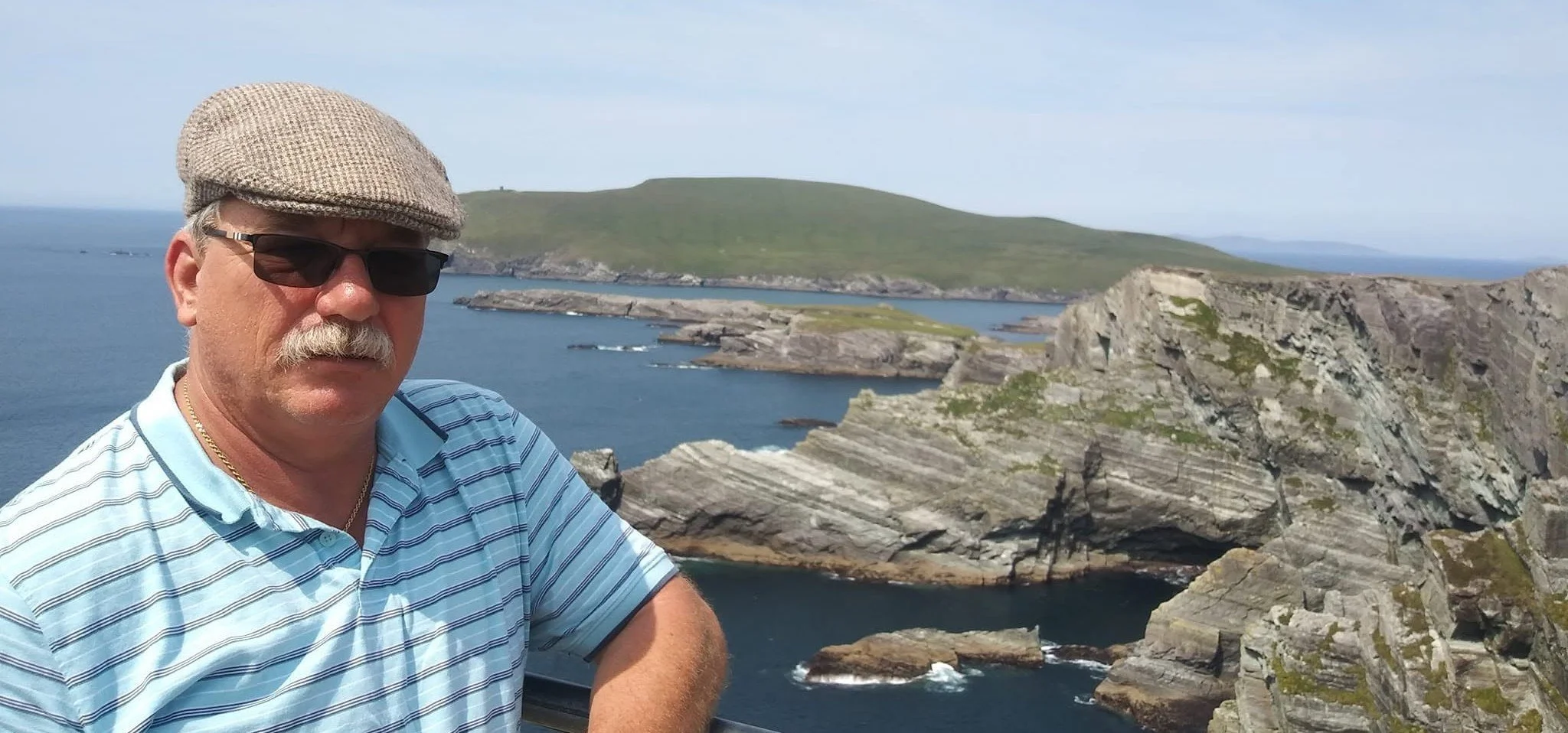 Brian overlooking the Atlantic coastline at the Kilkee Cliffs in County Clare, Ireland.