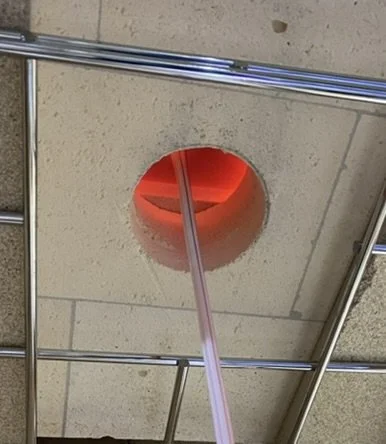 Molten glass murrini cane.
