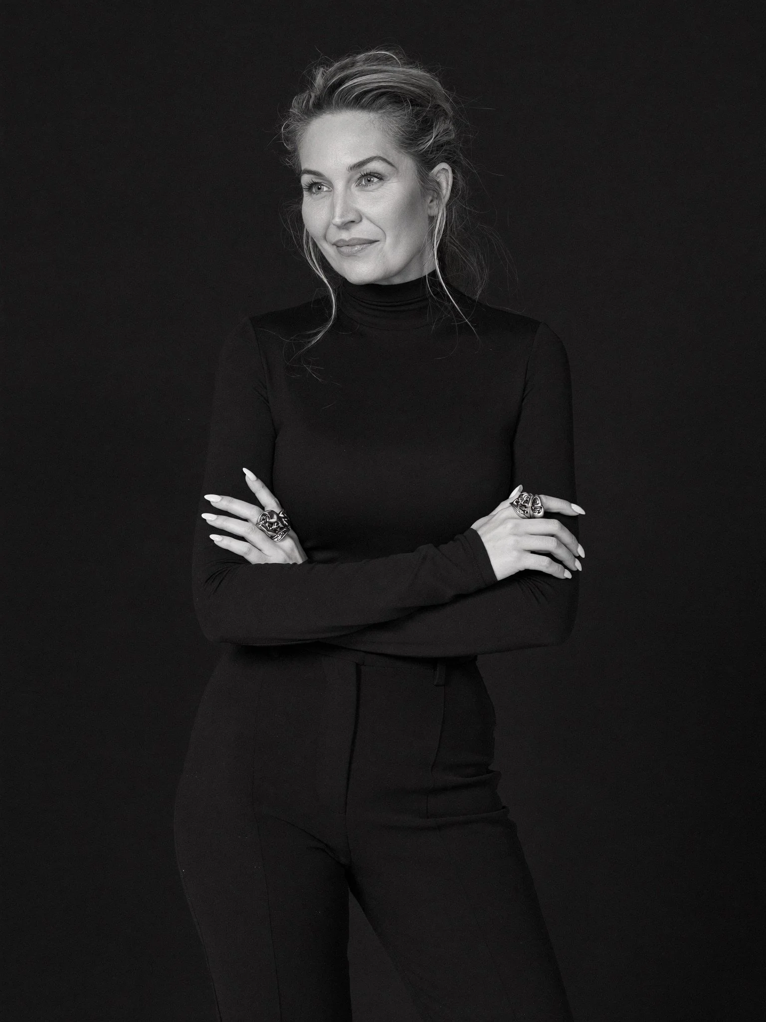 Brielle Fontaine in a playful editorial studio portrait for her online transformation mentoring practice.