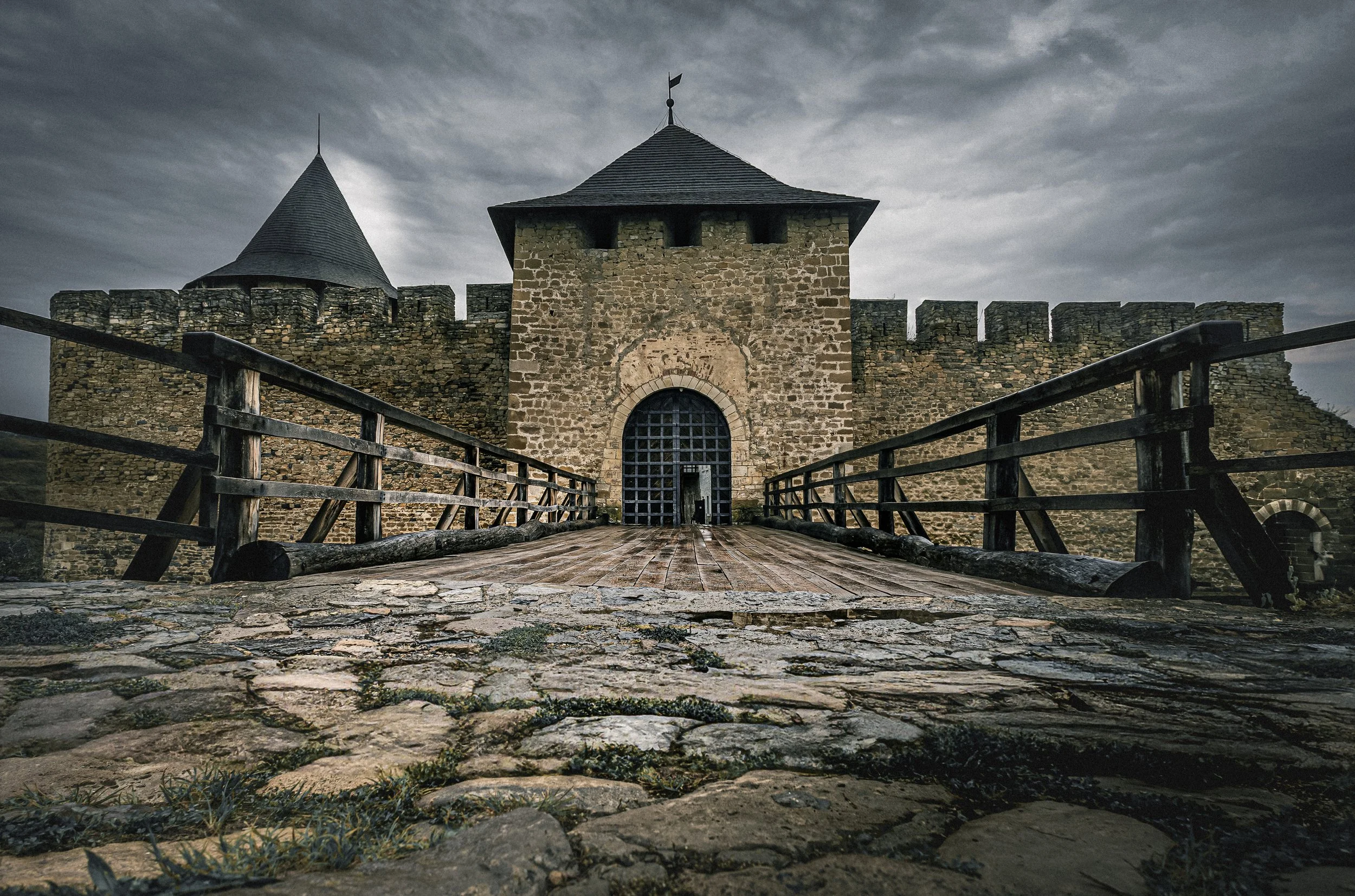 Entrance Gate. Tower of Khotyn Fortress — the main entrance to the medieval stronghold, reached by a bridge across the defensive moat. The present gate tower was built around 1540–1544.