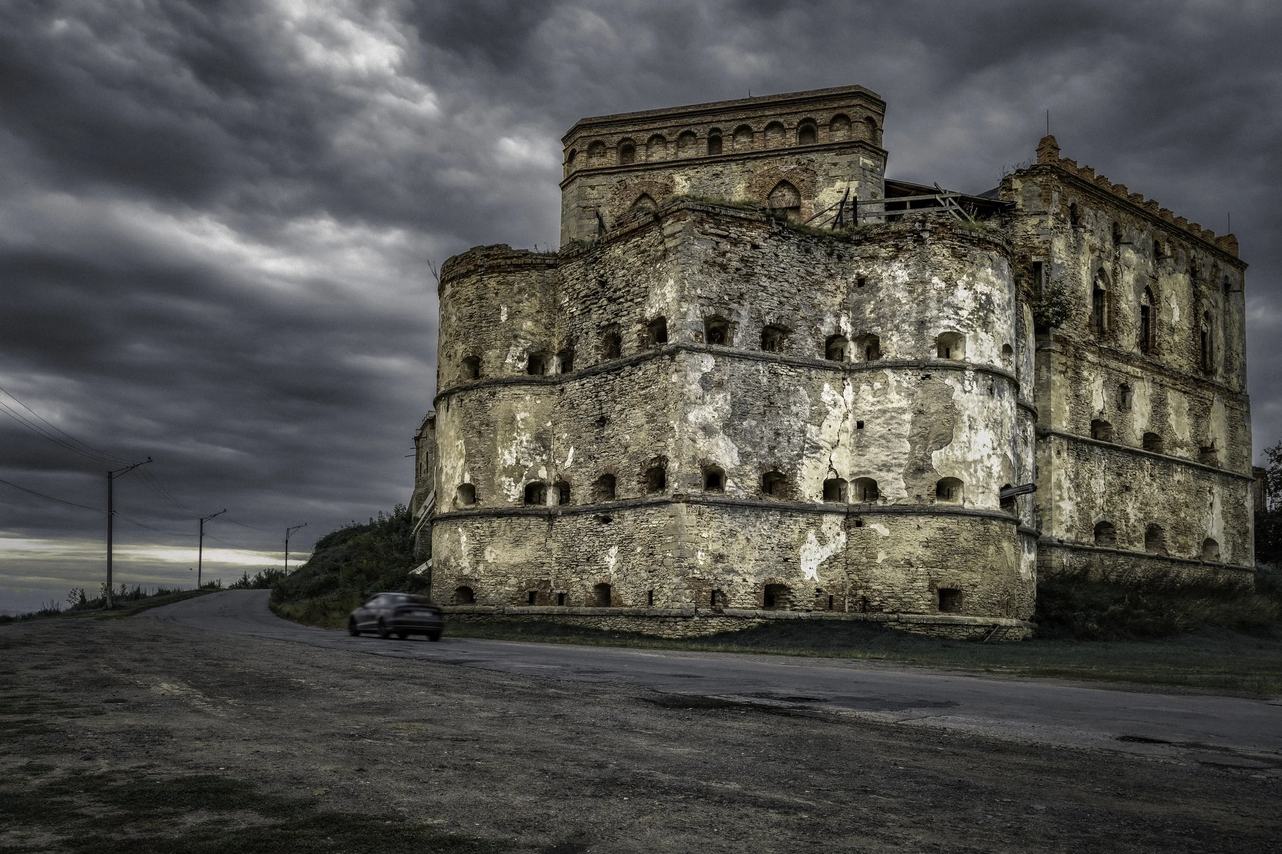Medzhybizh Castle — western fortifications. The castle stands at the confluence of the Southern Bug and Buzhok rivers in Khmelnytskyi Oblast. Its present architectural ensemble developed mainly between the XIV and XVI centuries and combines defensive
