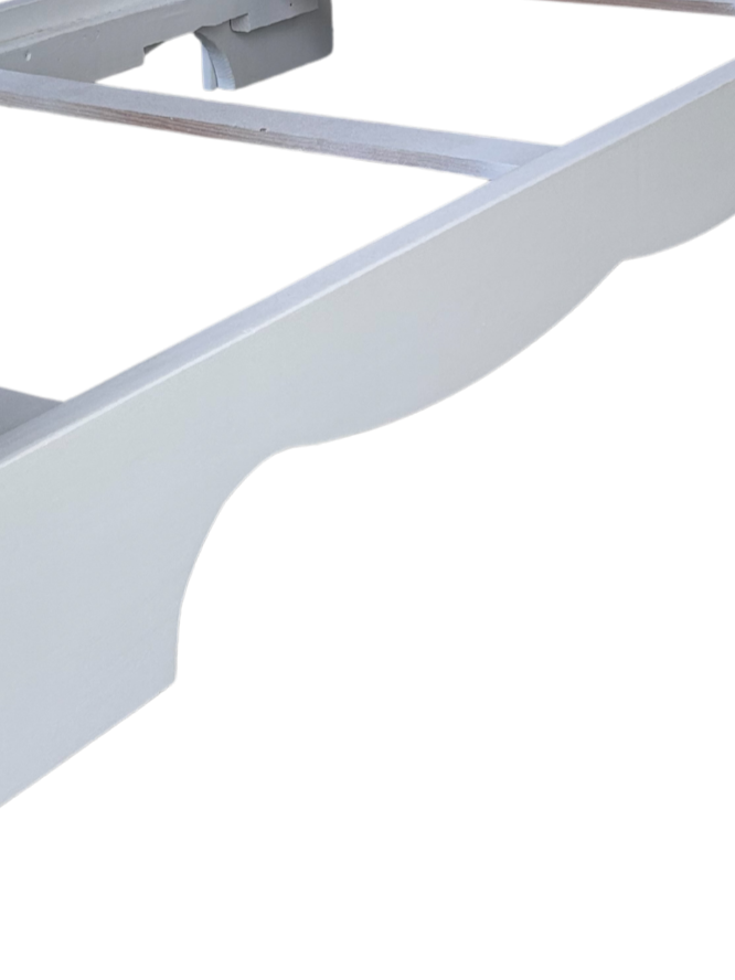 Close-up of the decorative side edge design on a custom children's bed.