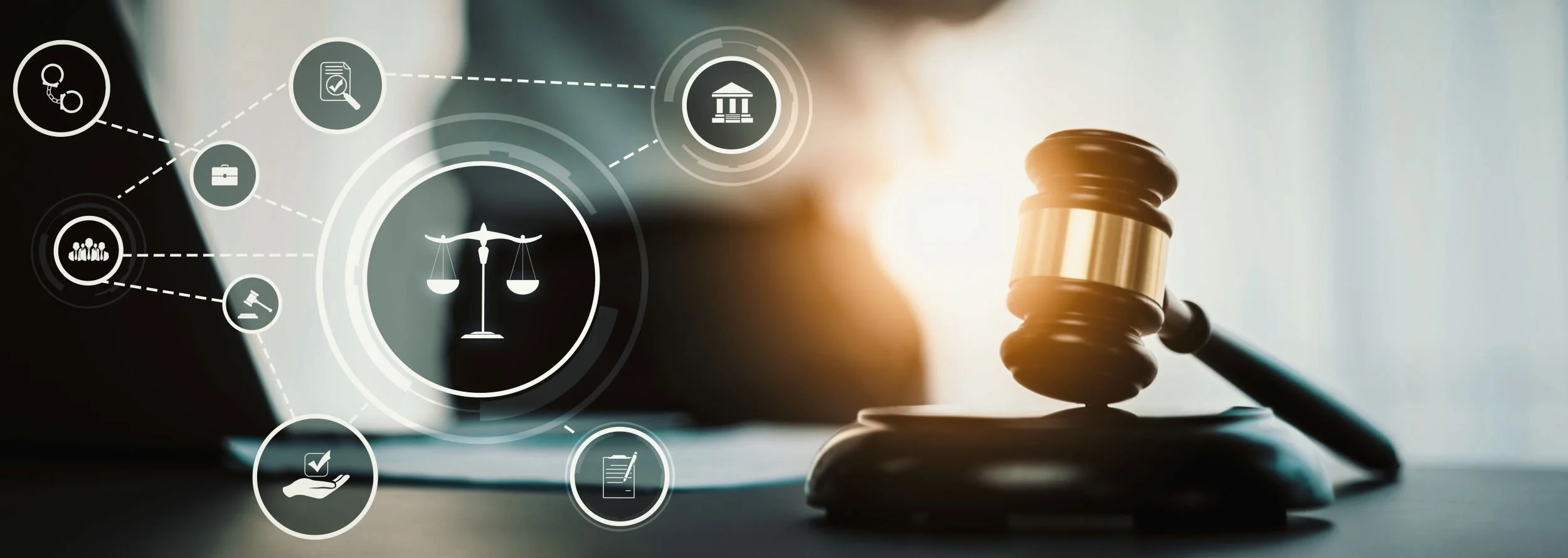 A gavel resting on a block with a blurred background, overlaid with digital icons related to law, justice, and legal concepts, including a scales of justice symbol at the center.