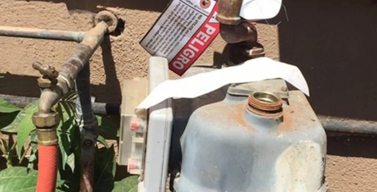 home with exposed corroded galvanized steel pipes