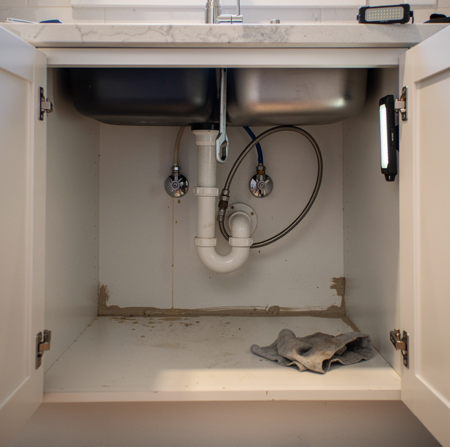 kitchen sink with three deck holes and shutoff valves