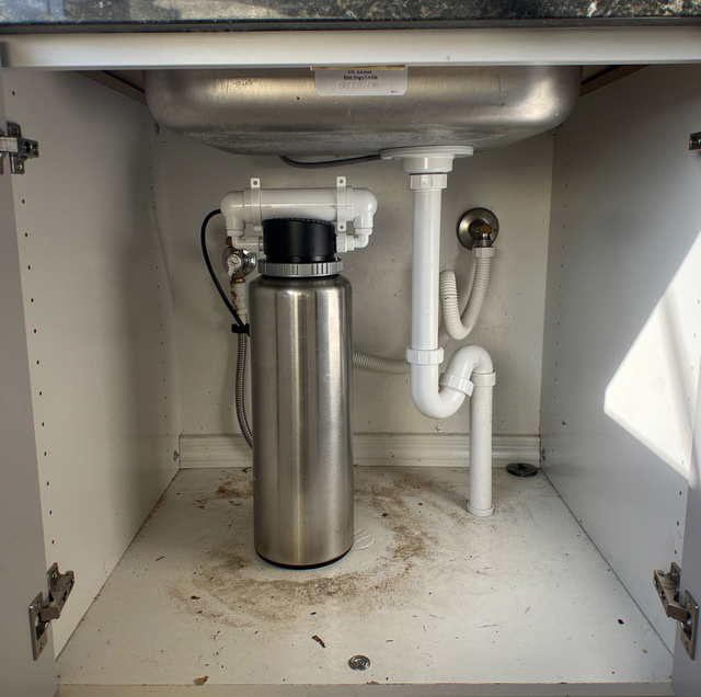 under-sink cabinet with reverse osmosis storage tank