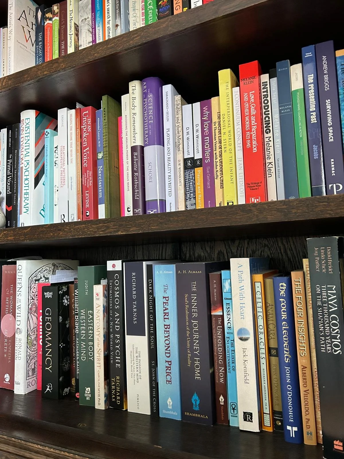 Bookshelves filled with various Psychotherapy books in the therapy room for Clinical Supervision in Enfield, Middlesex.