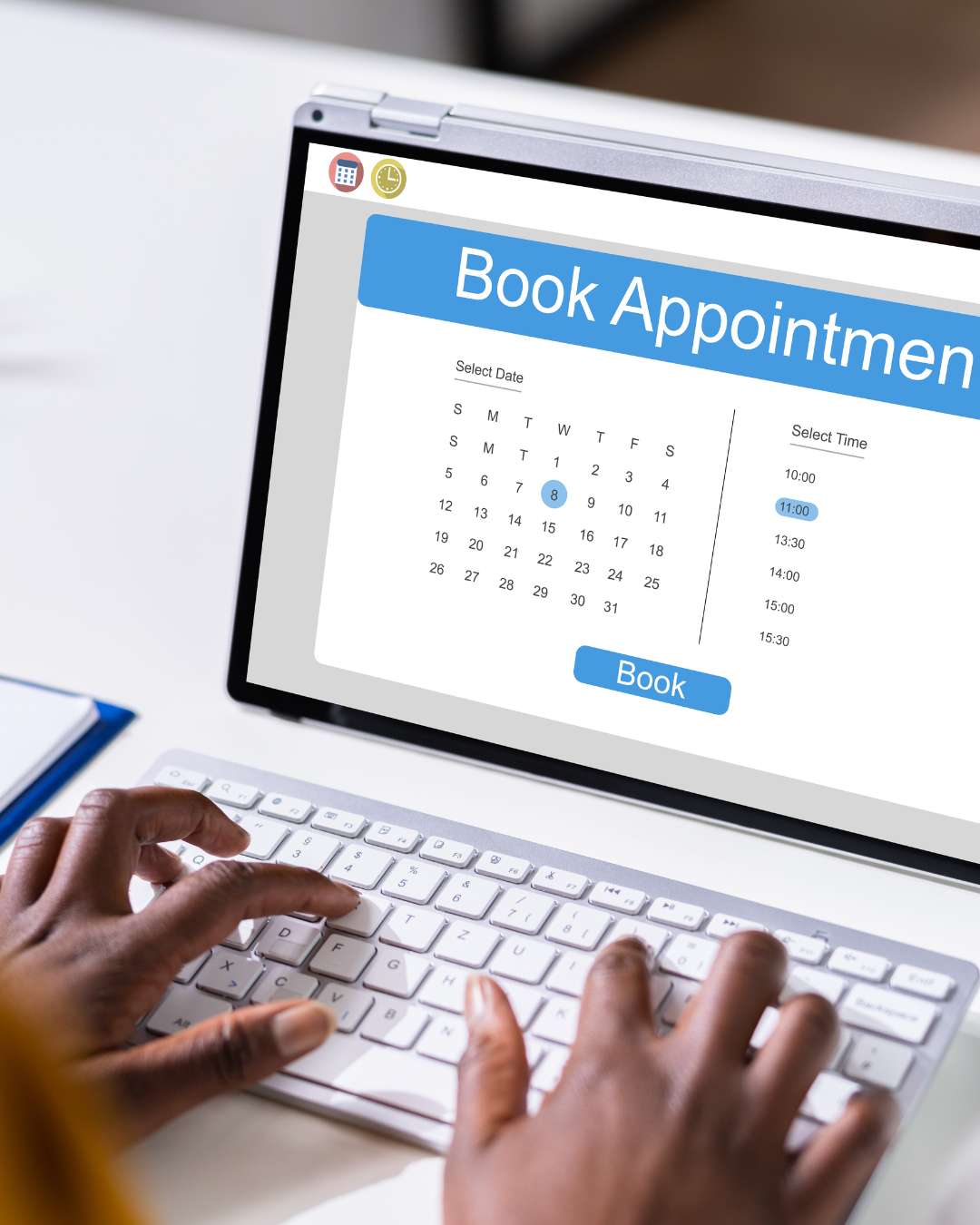 Person booking a medical appointment on a laptop, selecting a date and time from an online scheduler.