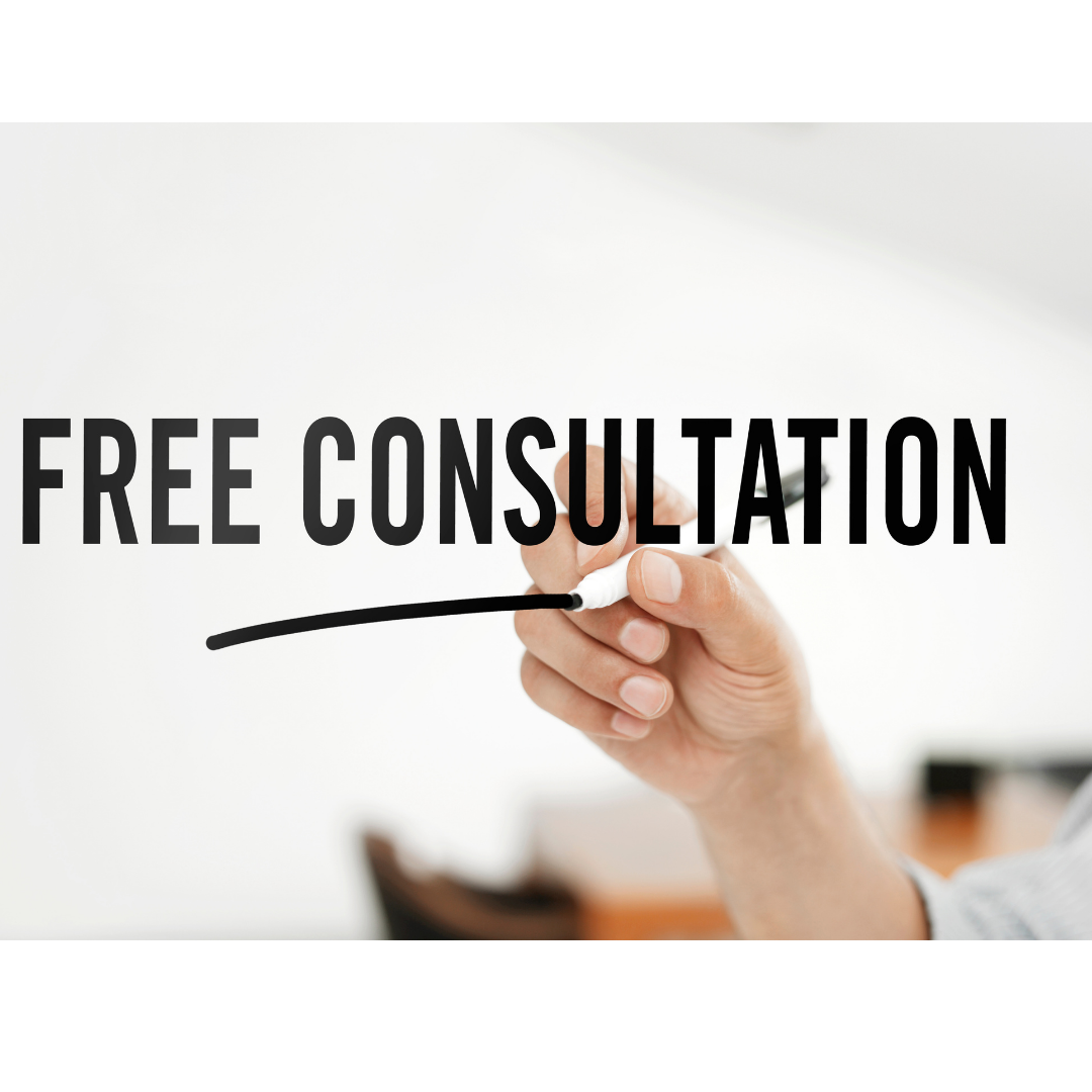 Hand writing 'FREE CONSULTATION' on a transparent surface.