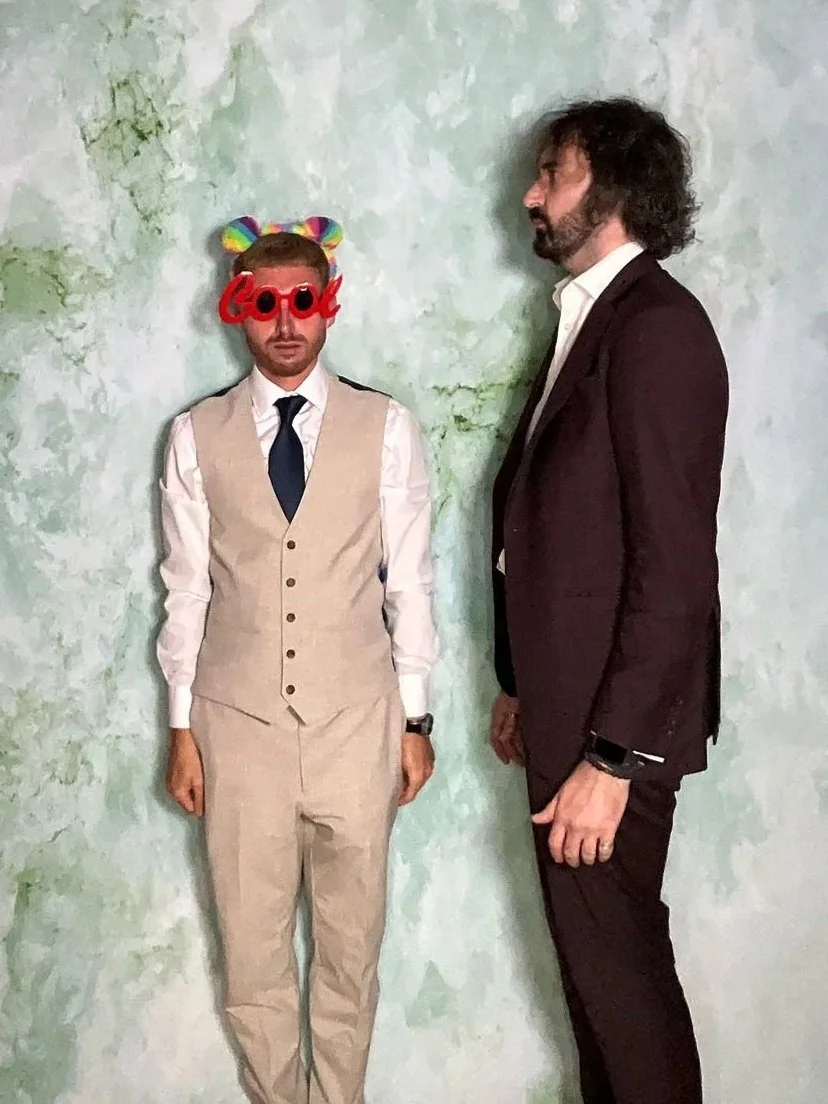 Groomsmen posing with novelty props at a photo booth hire wedding in Lincolnshire