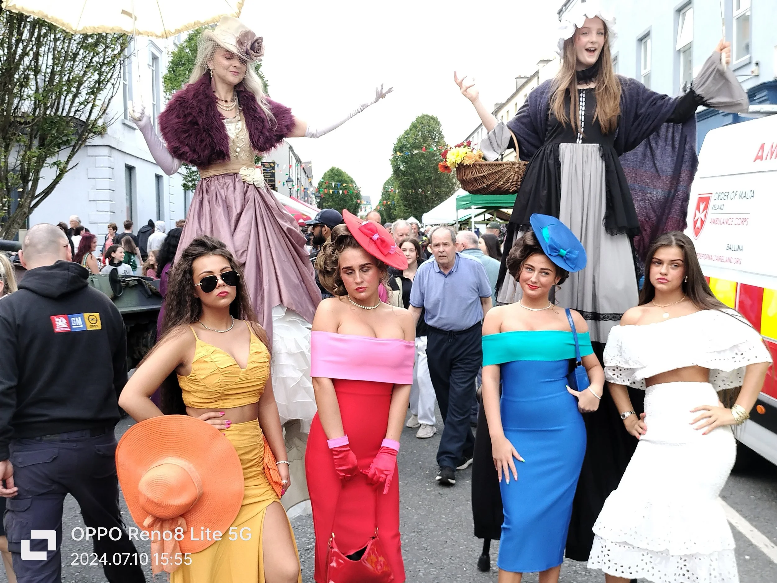 Race day; stilt walkers; models; 