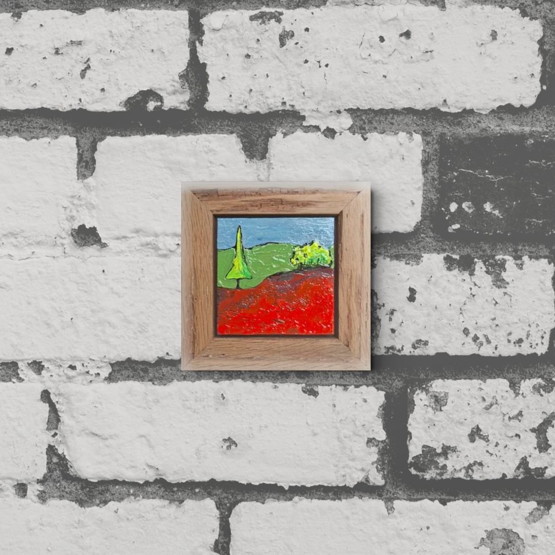 tiny landscape with red field