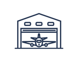 An airplane inside a hangar.