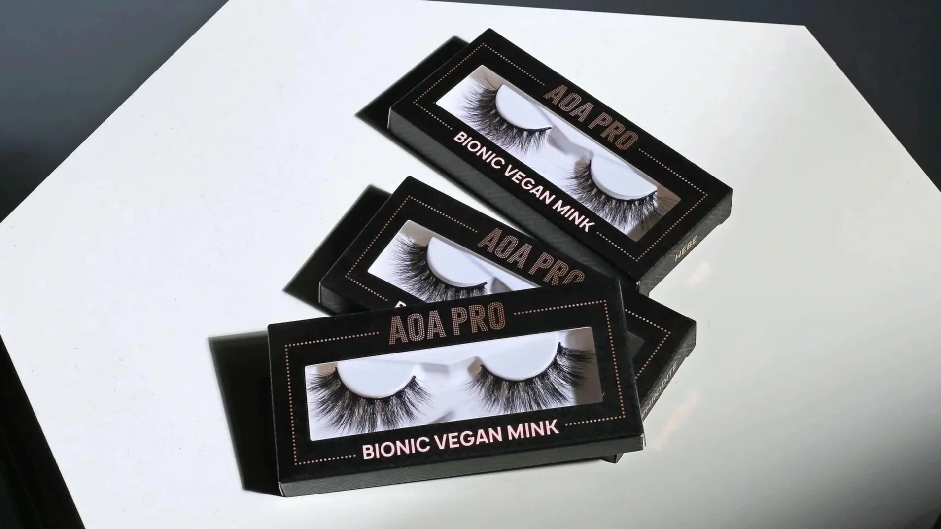 A styled image of a few styles of the AOA Pro Bionic Lashes