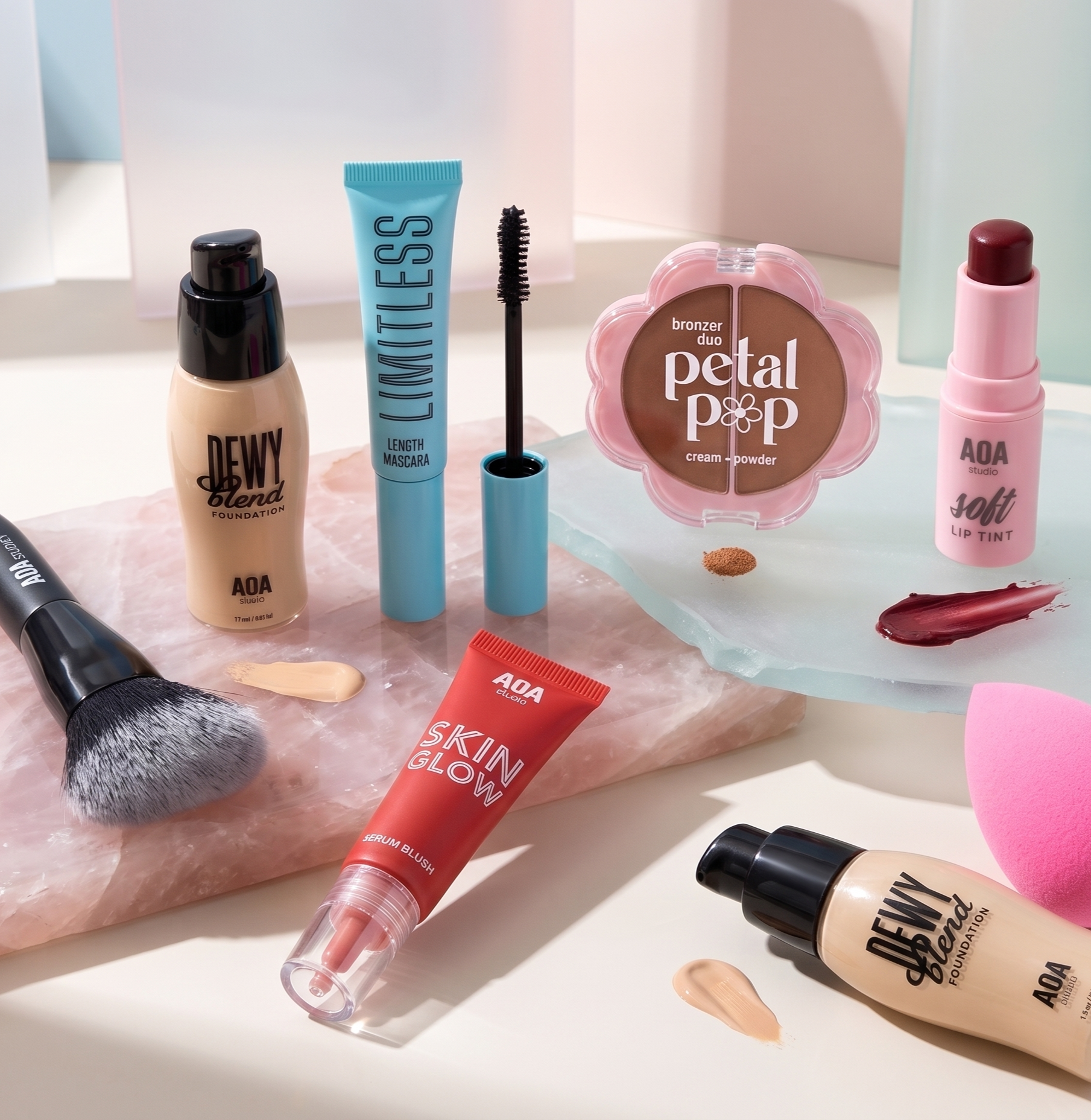 a styled image of a variety of AOA Studio cosmetics