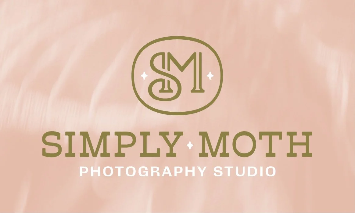 Logo of Simply Moth Photography Studio with a stylized monogram 'SM' within a circle, on a silky, blush-colored background.