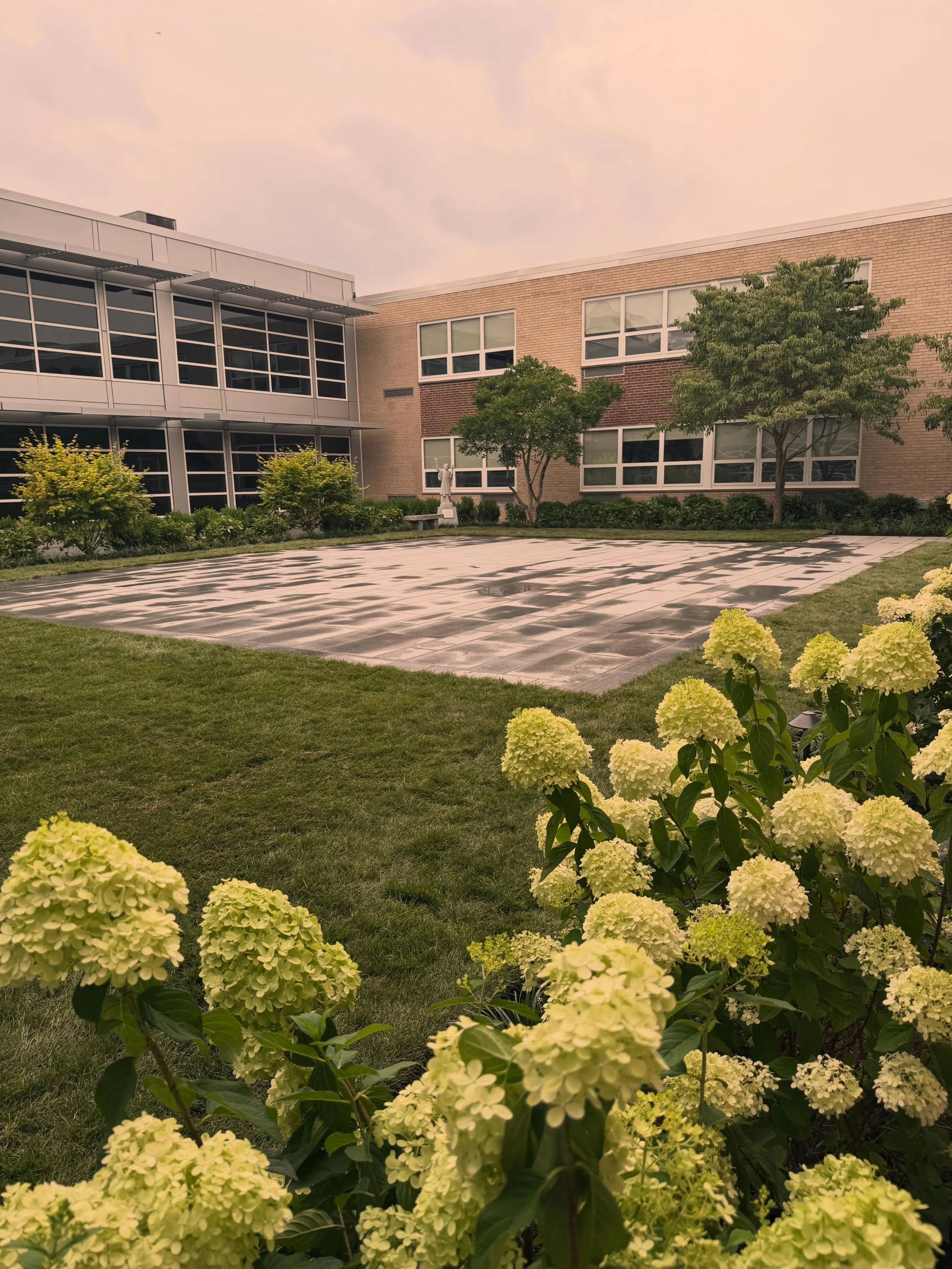We had the absolute pleasure of doing a complete overhaul  of this courtyard at my alma mater Xaverian Brothers High School last summer. To execute this project we used specialty fabricated containers to move materials through a tunnel we constructed