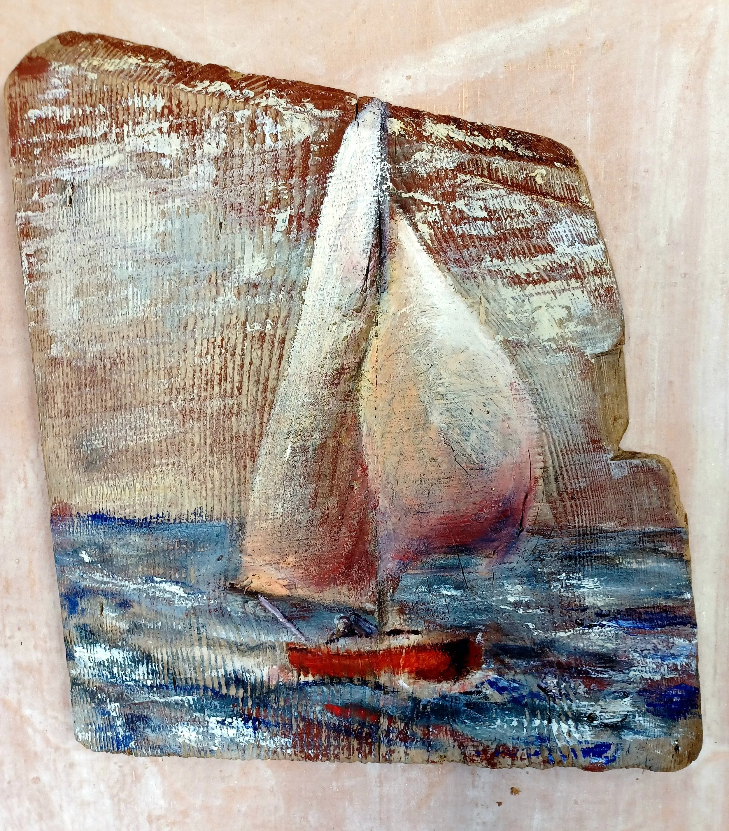 Seaside artwork painted on weathered beach-found larch timber by artist Francois Gunning. (95 characters)
