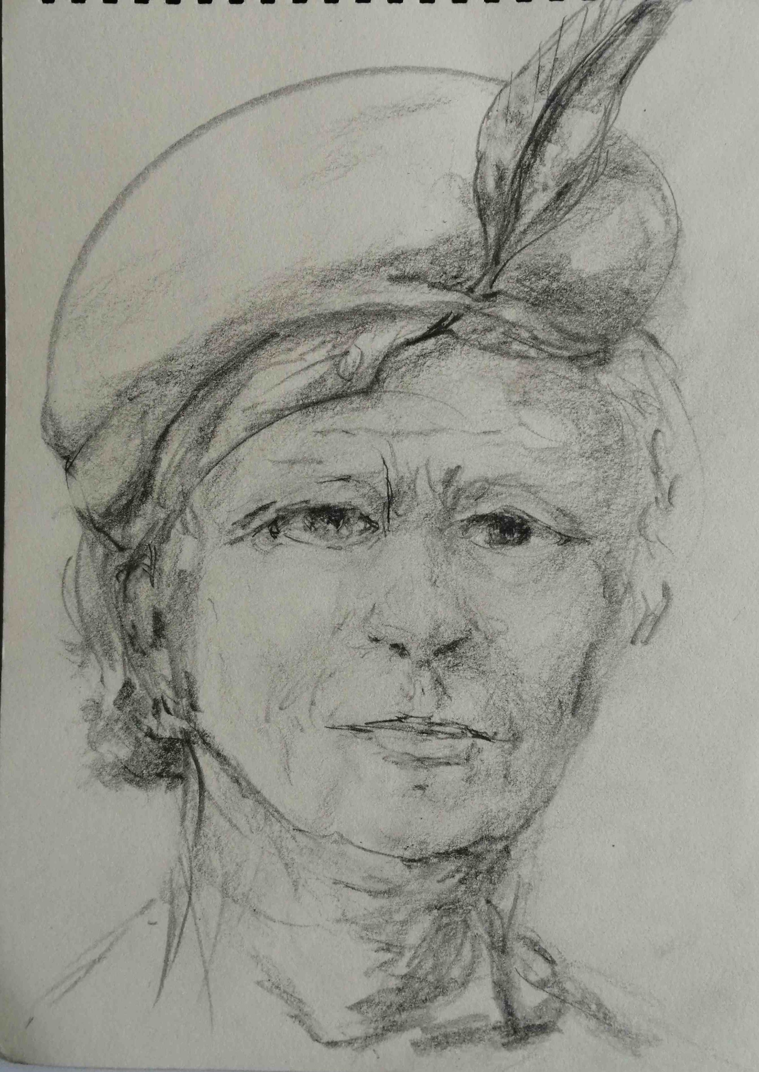 Portrait of a woman wearing a feathered hat