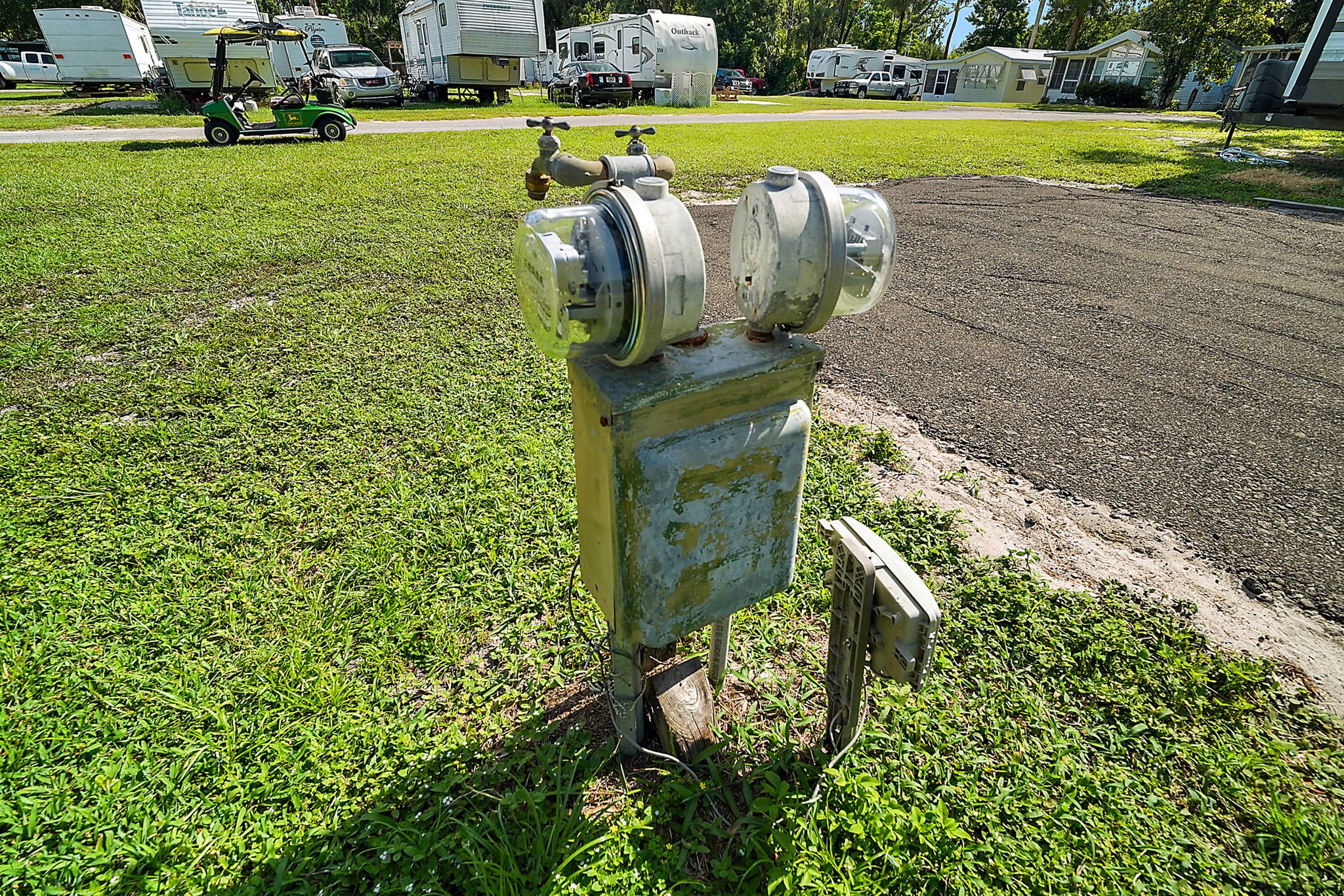 Electric utility pedestal providing full 30 amp and 50 amp hookups at Creekside Mobile Home and RV Park in Punta Gorda FL