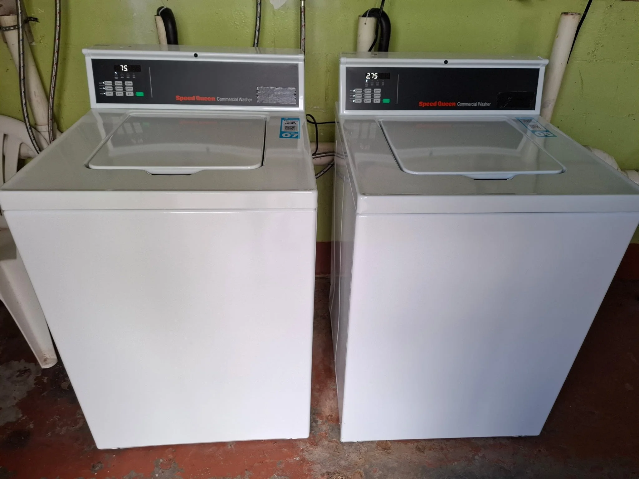 Washing machines inside the laundry facility at Creekside Mobile Home and RV Park