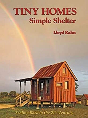 Book cover titled 'Tiny Homes Simple Shelter' by Lloyd Kahn, featuring a small wooden tiny house on stilts with a rainbow in the background, and the subtitle 'Scaling Back in the 21st Century'.