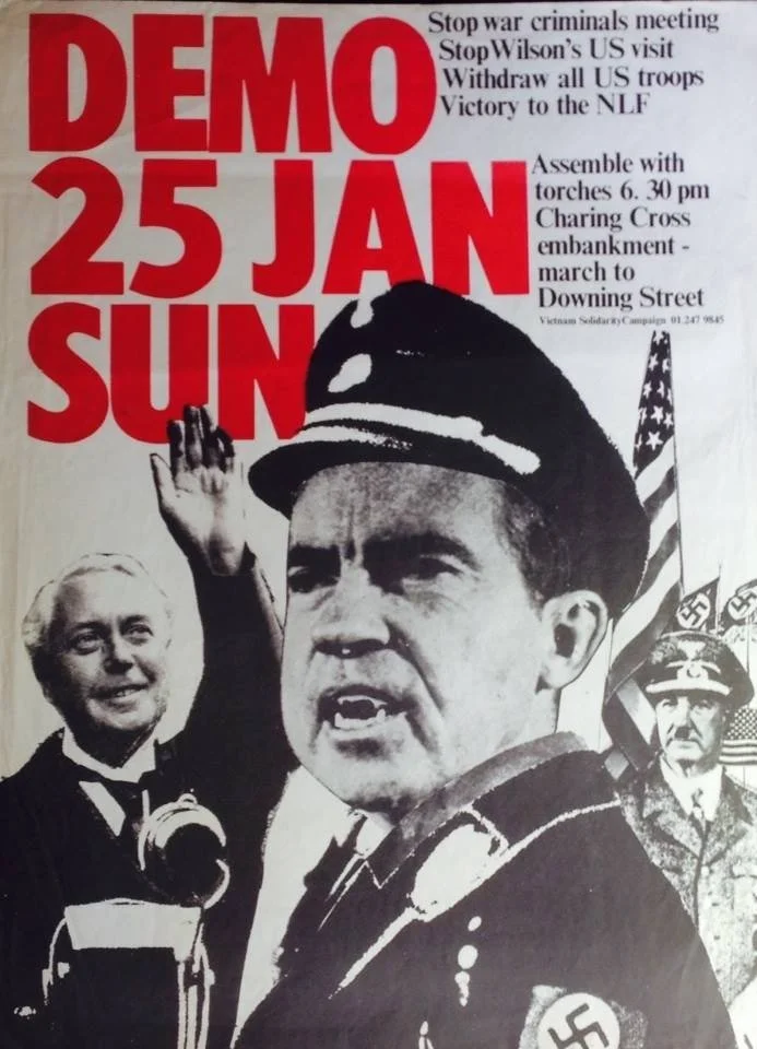 Black and white poster for a demonstration on January 25th, Sunday, with large red text. The poster features a man in a police uniform in the foreground, with a woman in the background and military figures. Text includes calls to stop war criminals, withdraw US troops, and victory to the NLF, along with details about assembling with torches at 6:30 pm, a march to Downing Street, and mentions Vietnam Solidarity Campaign.