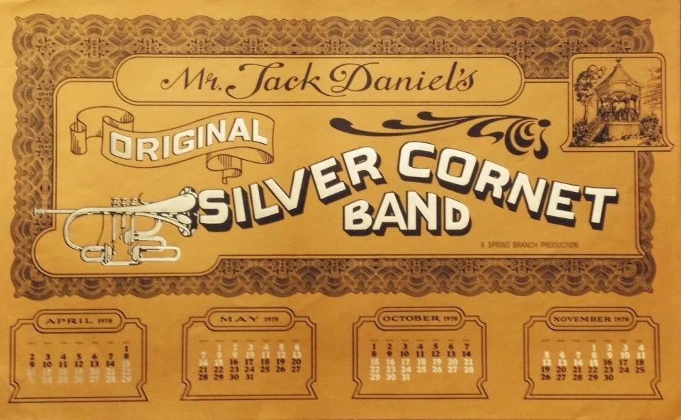 Vintage calendar for the year 1978, featuring Mr. Jack Daniel's Original Silver Cornet Band, with illustrations of a trumpet and a small gazebo with musicians.